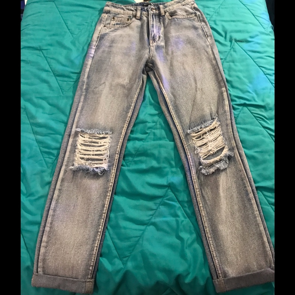 Mid rise light blue open knee boyfriend jeans